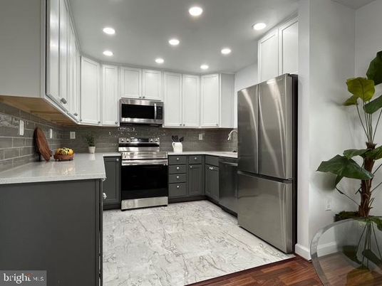 Interior, Kitchen, Marble, Recessed Lighting, Stainless Steel Appliances, Wood Texture Flooring