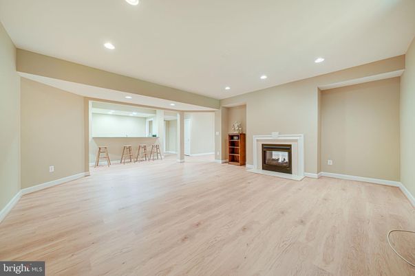 Empty room, Fireplace, Interior, Recessed Lighting, Wood Texture Flooring