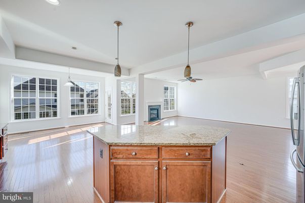 Fireplace, Interior, Kitchen, Pendant Lights, Recessed Lighting, Wood Texture Flooring