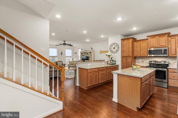 Dining room, Interior, Kitchen, Recessed Lighting, Stainless Steel Appliances, Wood Texture Flooring