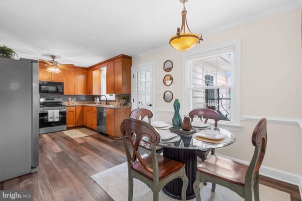 Dining room, Interior, Kitchen, Pendant Lights, Stainless Steel Appliances, Wood Texture Flooring