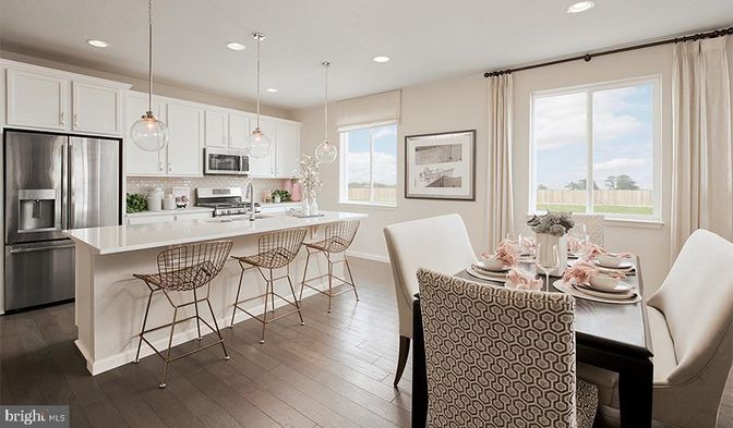 Dining room, Interior, Kitchen, Pendant Lights, Recessed Lighting, Stainless Steel Appliances, Wood Texture Flooring