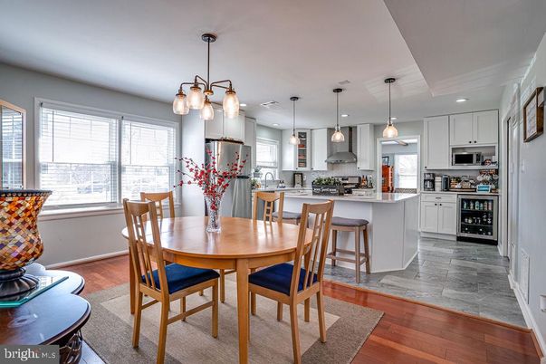 Dining room, Interior, Kitchen, Pendant Lights, Recessed Lighting, Stainless Steel Appliances, Wood Texture Flooring