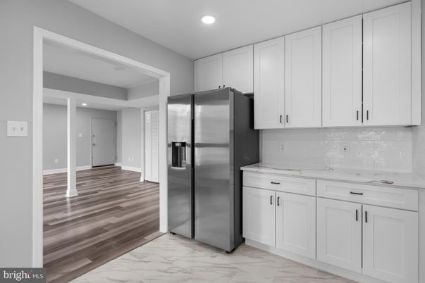Interior, Kitchen, Marble, Recessed Lighting, Stainless Steel Appliances, Wood Texture Flooring