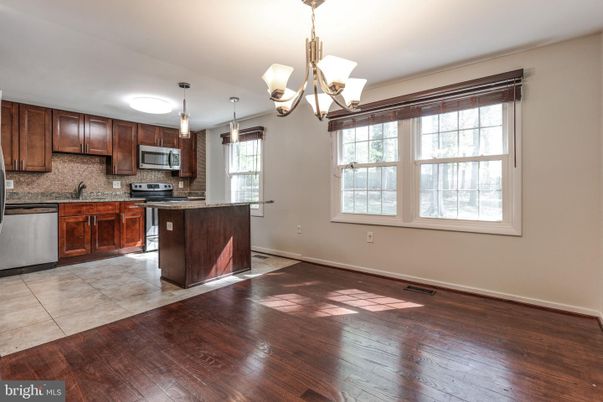 Chandelier, Interior, Kitchen, Pendant Lights, Stainless Steel Appliances, Wood Texture Flooring