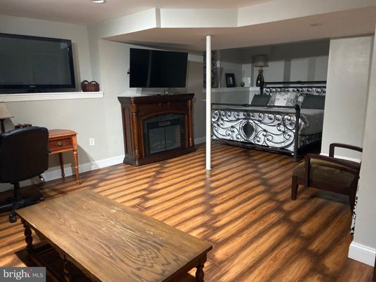 Bedroom, Fireplace, Interior, Recessed Lighting, Wood Texture Flooring