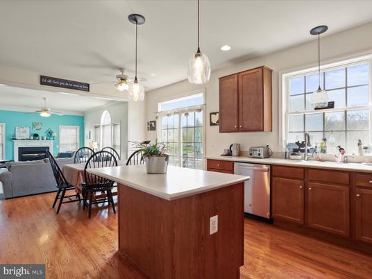 Dining room, Fireplace, Interior, Kitchen, Pendant Lights, Recessed Lighting, Wood Texture Flooring