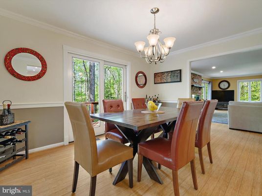 Chandelier, Dining room, Fireplace, Interior, Living room, Recessed Lighting, Wood Texture Flooring