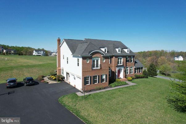 Attached, Backyard, Exterior, Facade, Brick Facade, French Provincial