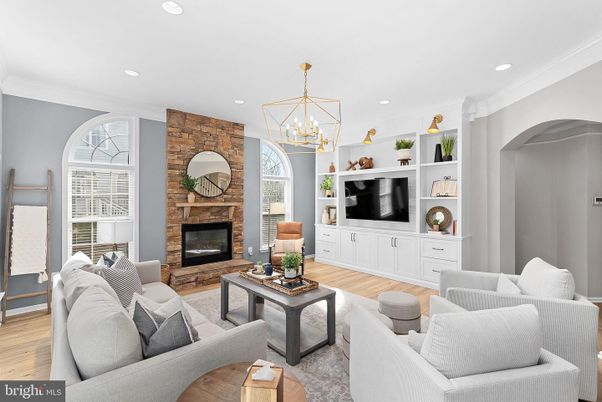 Fireplace, Interior, Living room, Pendant Lights, Recessed Lighting, Stone Walls, Wood Texture Flooring