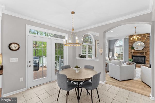 Dining room, Fireplace, Interior, Living room, Pendant Lights, Recessed Lighting, Wood Texture Flooring