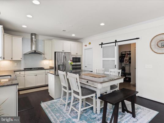 Dining room, Interior, Kitchen, Recessed Lighting, Stainless Steel Appliances, Wood Texture Flooring