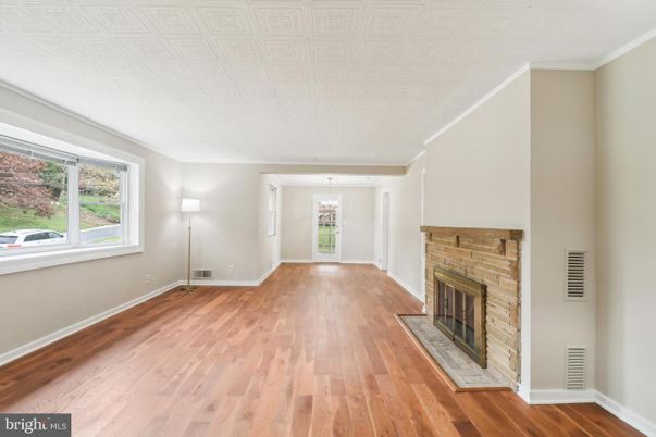 Empty room, Fireplace, Interior, Pendant Lights, Wood Texture Flooring