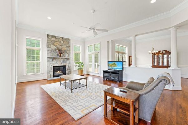 Fireplace, Interior, Living room, Pendant Lights, Recessed Lighting, Stone Walls, Wood Texture Flooring