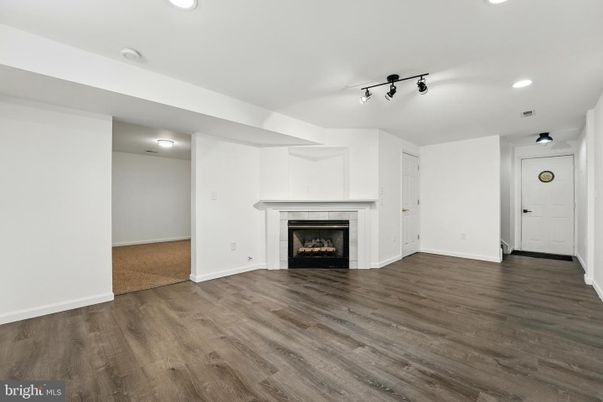 Empty room, Fireplace, Interior, Recessed Lighting, Wood Texture Flooring