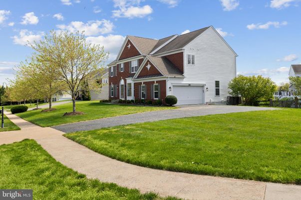 Attached, Backyard, Exterior, Facade, Brick Facade, Queen Anne Victorian