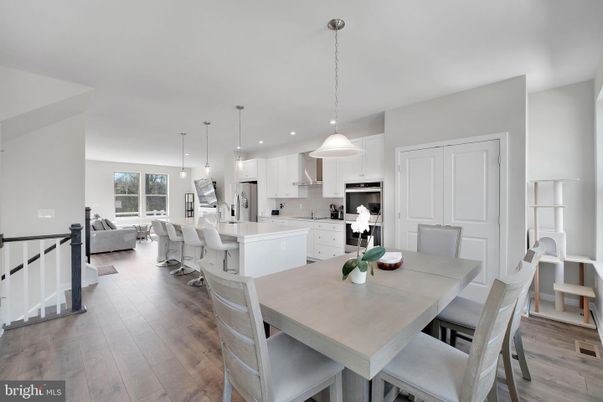 Dining room, Interior, Kitchen, Living room, Pendant Lights, Recessed Lighting, Stainless Steel Appliances, Wood Texture Flooring