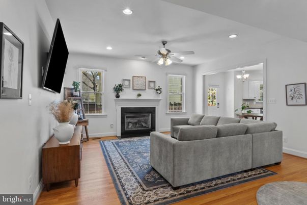 Chandelier, Fireplace, Interior, Living room, Recessed Lighting, Wood Texture Flooring