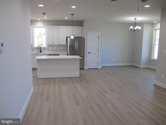 Chandelier, Interior, Kitchen, Pendant Lights, Recessed Lighting, Stainless Steel Appliances, Wood Texture Flooring