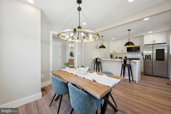 Dining room, Interior, Kitchen, Pendant Lights, Recessed Lighting, Stainless Steel Appliances, Wood Texture Flooring
