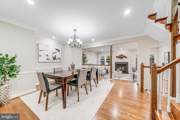 Chandelier, Dining room, Fireplace, Interior, Living room, Recessed Lighting, Wood Texture Flooring