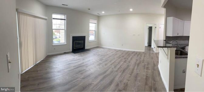 Empty room, Fireplace, Interior, Recessed Lighting, Wood Texture Flooring
