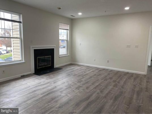 Empty room, Fireplace, Interior, Recessed Lighting, Wood Texture Flooring