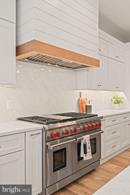 Interior, Kitchen, Marble Walls, Stainless Steel Appliances, Wood Texture Flooring