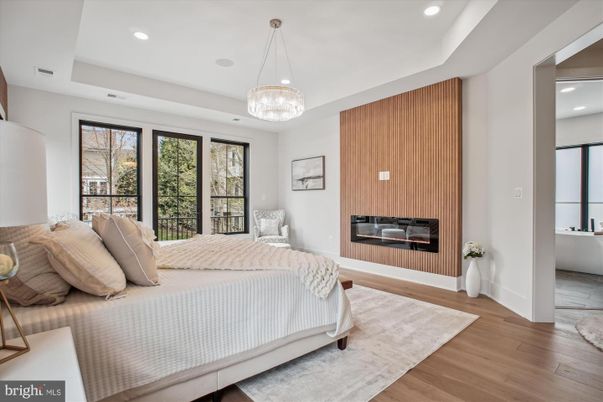 Bedroom, Fireplace, Interior, Pendant Lights, Recessed Lighting, Wood Texture Flooring