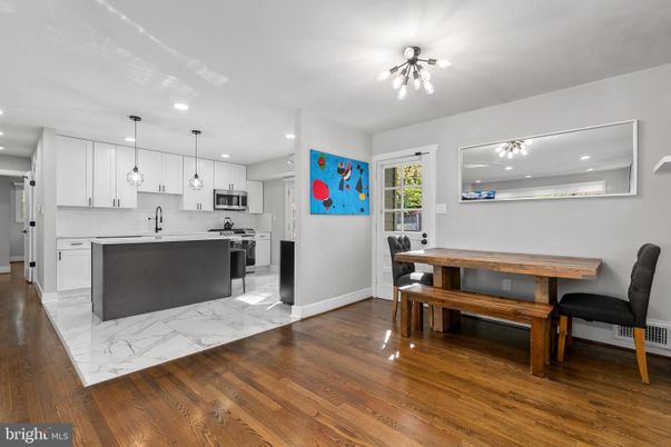 Dining room, Interior, Kitchen, Marble, Pendant Lights, Recessed Lighting, Stainless Steel Appliances, Wood Texture Flooring