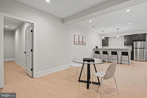 Dining room, Interior, Kitchen, Pendant Lights, Recessed Lighting, Stainless Steel Appliances, Wood Texture Flooring
