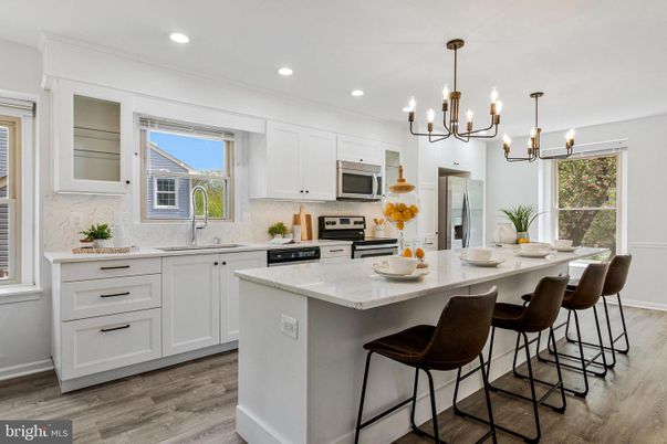 Chandelier, Interior, Kitchen, Pendant Lights, Recessed Lighting, Stainless Steel Appliances, Wood Texture Flooring