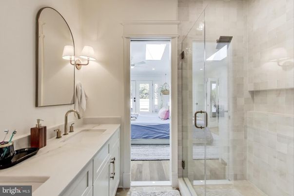 Bathroom, Dual Sink Vanities, Glass Shower, Interior, Wood Texture Flooring