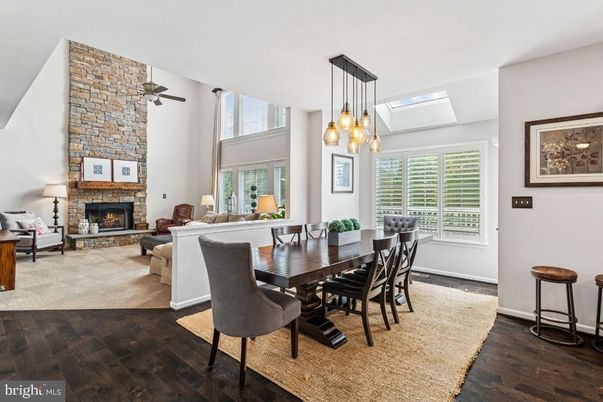Dining room, Fireplace, Interior, Living room, Pendant Lights, Stone Walls, Wood Texture Flooring