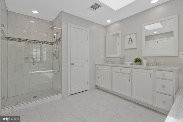 Bathroom, Dual Sink Vanities, Glass Shower, Interior, Marble, Marble Walls, Recessed Lighting