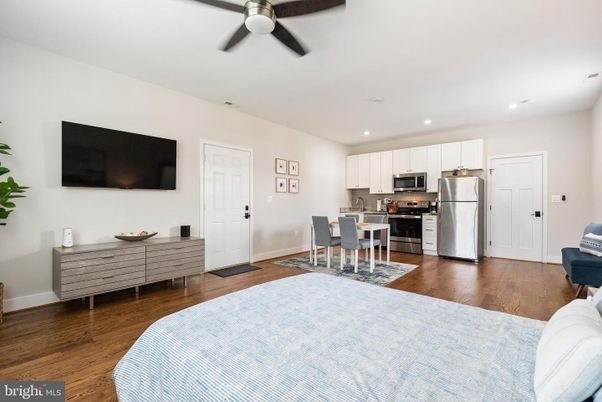 Dining room, Interior, Kitchen, Recessed Lighting, Stainless Steel Appliances, Wood Texture Flooring