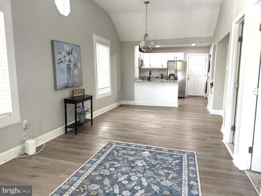Chandelier, Interior, Kitchen, Pendant Lights, Recessed Lighting, Stainless Steel Appliances, Wood Texture Flooring