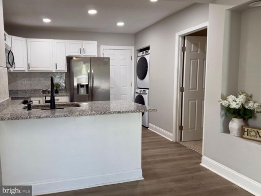 Interior, Kitchen, Recessed Lighting, Stainless Steel Appliances, Washer, Wood Texture Flooring