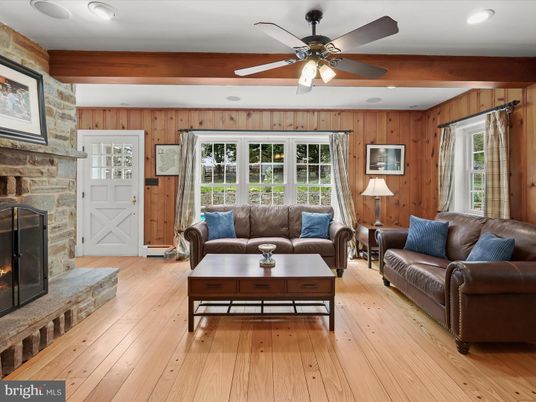 Fireplace, Interior, Living room, Recessed Lighting, Stone Walls, Wood Texture Flooring, Wooden Walls