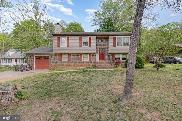 Attached, Exterior, Facade, Brick Facade, Raised Ranch