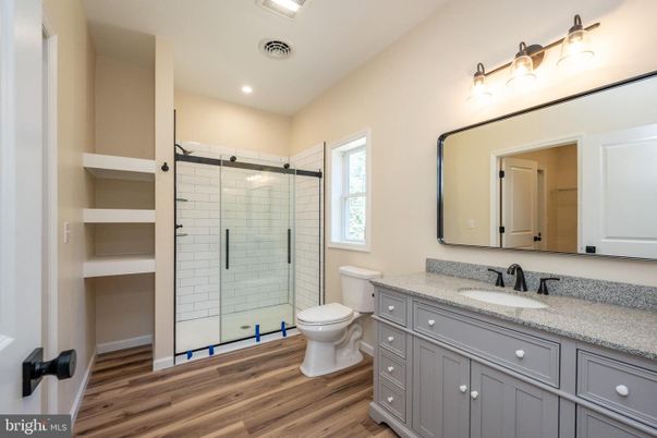 Bathroom, Glass Shower, Interior, Recessed Lighting, Wood Texture Flooring