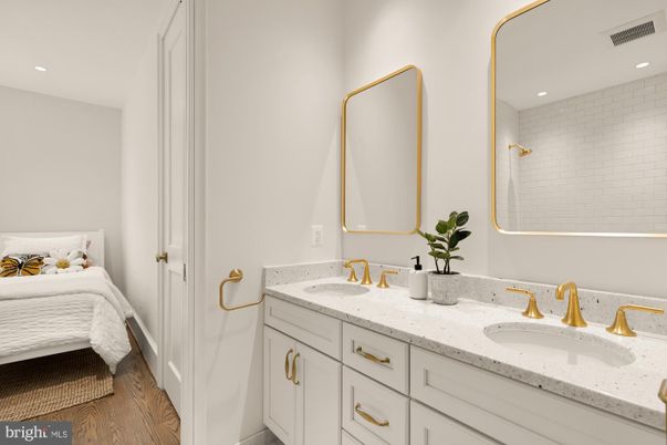 Bathroom, Dual Sink Vanities, Interior, Recessed Lighting, Wood Texture Flooring