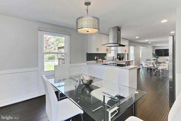 Dining room, Interior, Kitchen, Recessed Lighting, Stainless Steel Appliances, Wood Texture Flooring