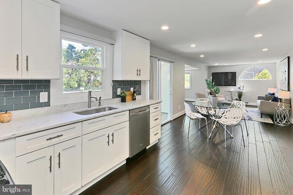 Dining room, Interior, Kitchen, Living room, Recessed Lighting, Stainless Steel Appliances, Wood Texture Flooring