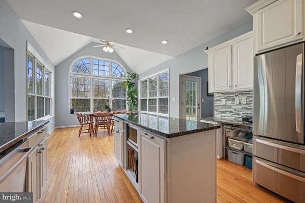 Dining room, Interior, Kitchen, Recessed Lighting, Stainless Steel Appliances, Wood Texture Flooring