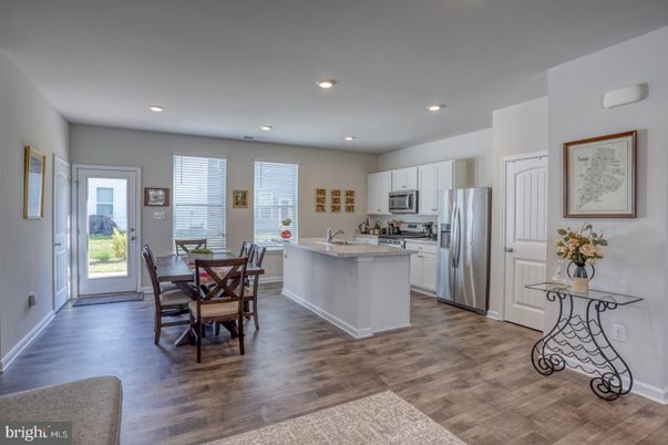 Dining room, Interior, Kitchen, Recessed Lighting, Stainless Steel Appliances, Wood Texture Flooring