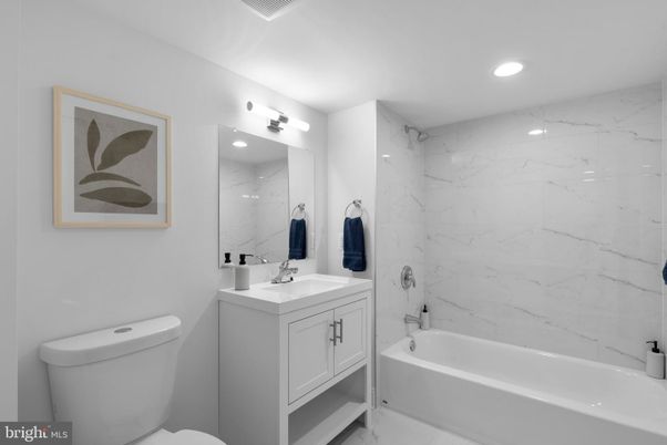 Bathroom, Dual Sink Vanities, Interior, Marble Walls, Recessed Lighting