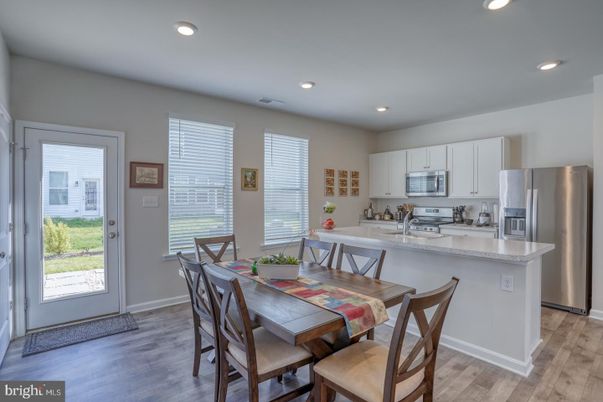 Dining room, Interior, Kitchen, Recessed Lighting, Stainless Steel Appliances, Wood Texture Flooring