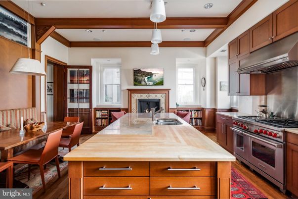 Dining room, Fireplace, Interior, Kitchen, Pendant Lights, Recessed Lighting, Stainless Steel Appliances, Wooden Beams, Wood Texture Flooring