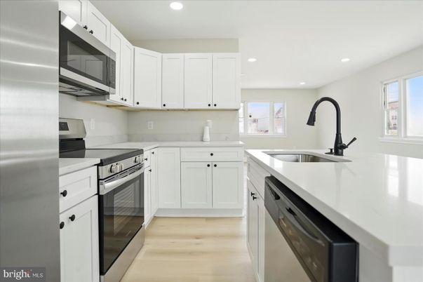 Interior, Kitchen, Recessed Lighting, Stainless Steel Appliances, Wood Texture Flooring